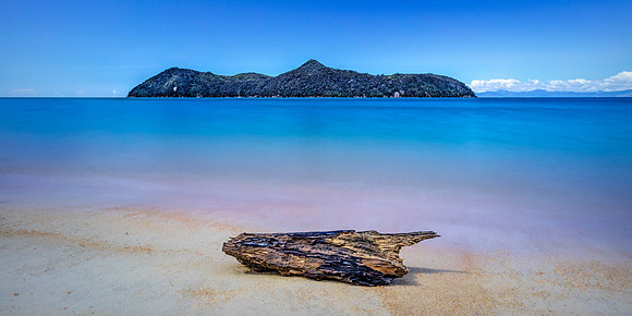 Island Symmetry and Driftwood